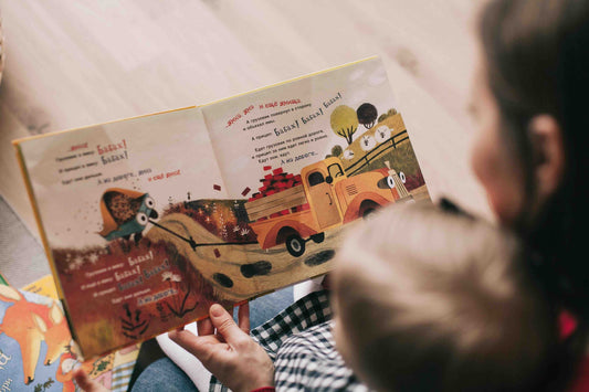 mother reading story to child