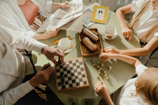 family playing checkers