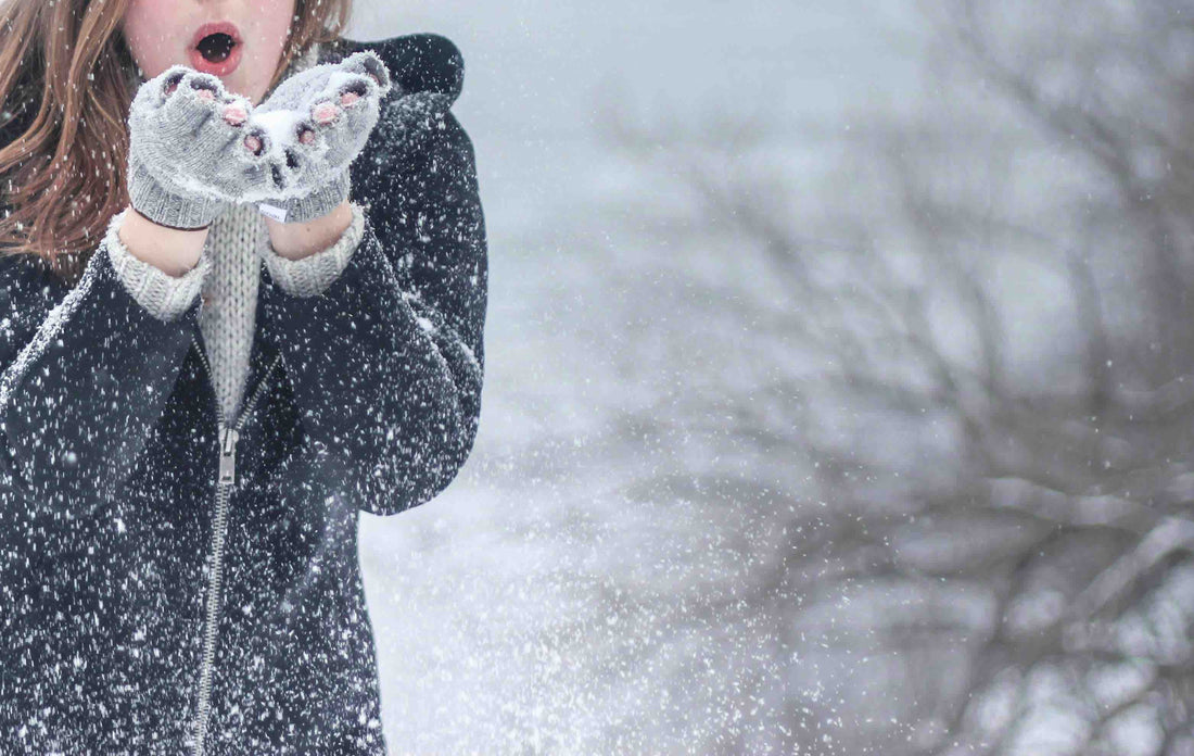 Girl playing in the snow