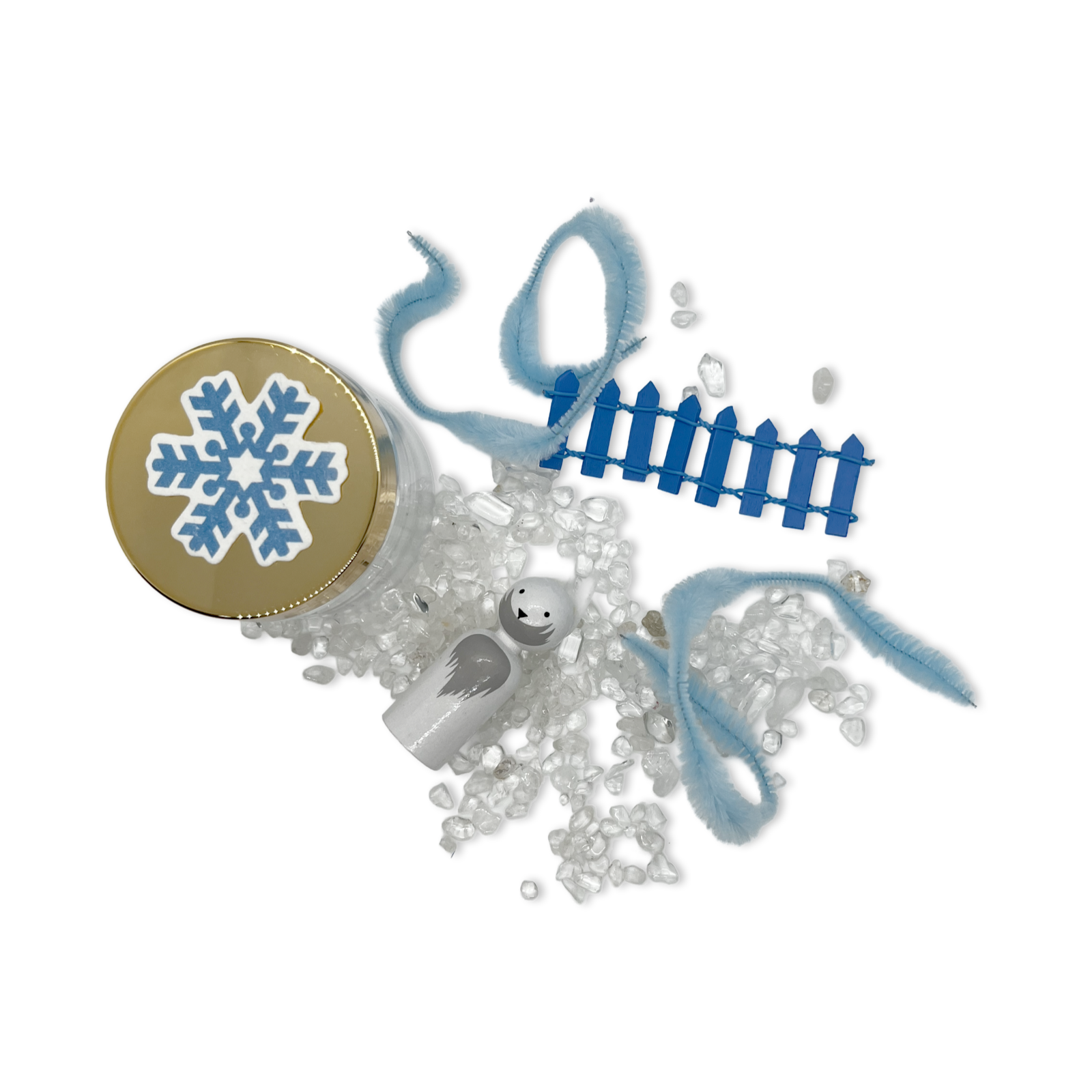 White arctic fox, seed paper snowflake, clear crystals, and fluffy blue pipe cleaners