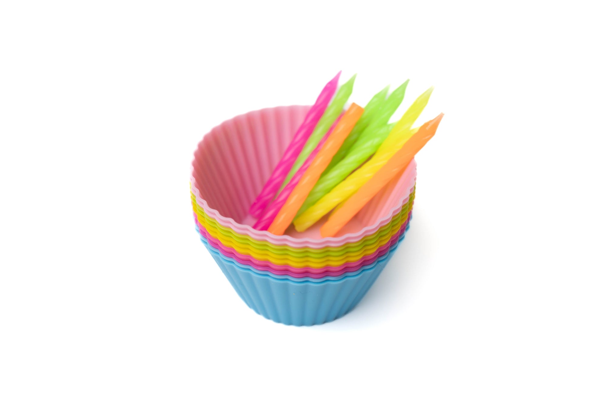 Rainbow birthday silicon cupcake wrappers with rainbow wax candles