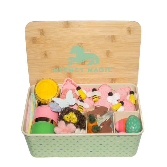 Contents: bees, chicks, felt flowers, carrots, Easter eggs, wooden, hand painted, spring time cookie stamps, pastel pipe cleaners, yellow, pink and green dough
