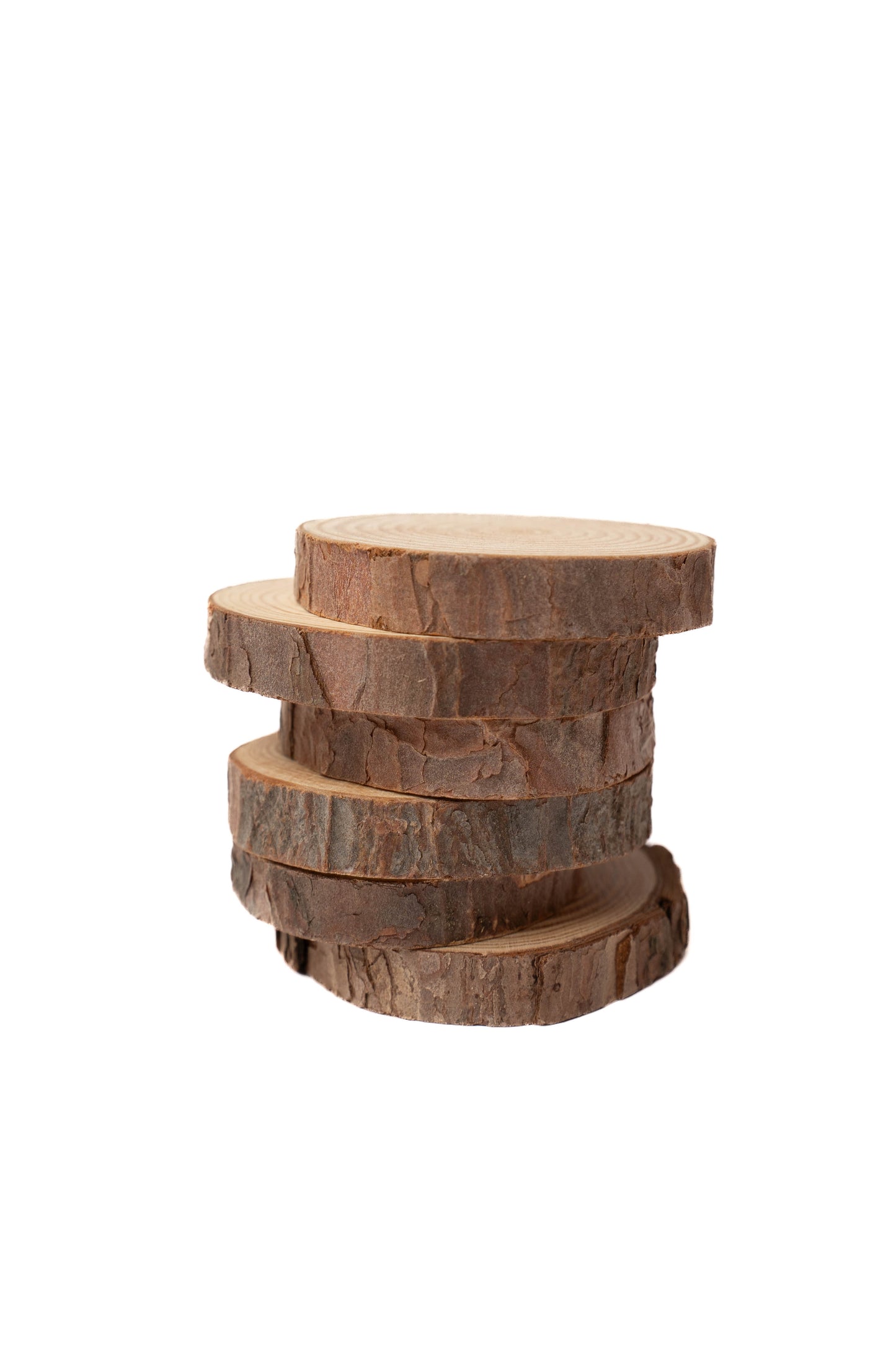 Natural wooden rounds with bark included