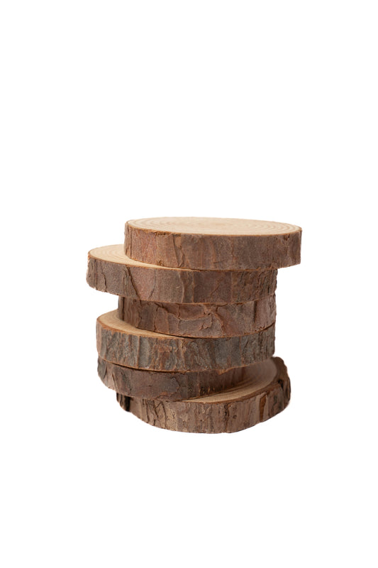 Natural wooden rounds with bark included