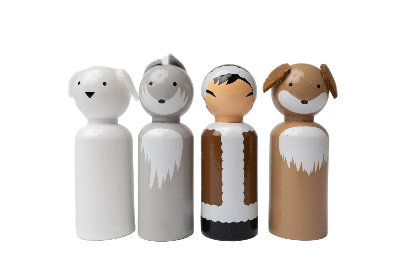 Hand painted wooden peg dolls including white polar bear, grey arctic fox, Inuit person, and brown fox