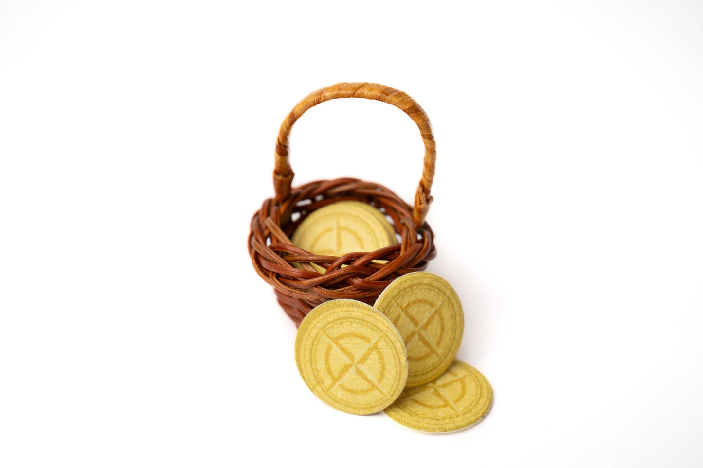 Woven basket with seed paper coins inside