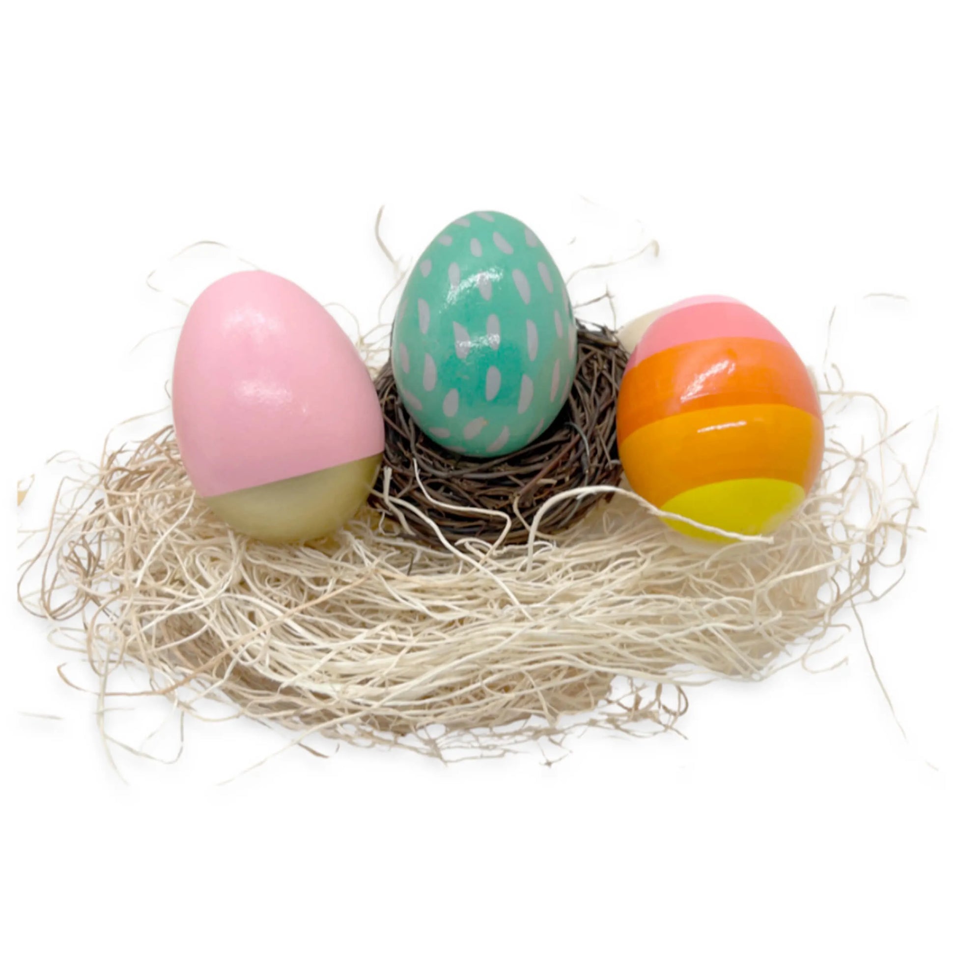wooden easter eggs in a nest
