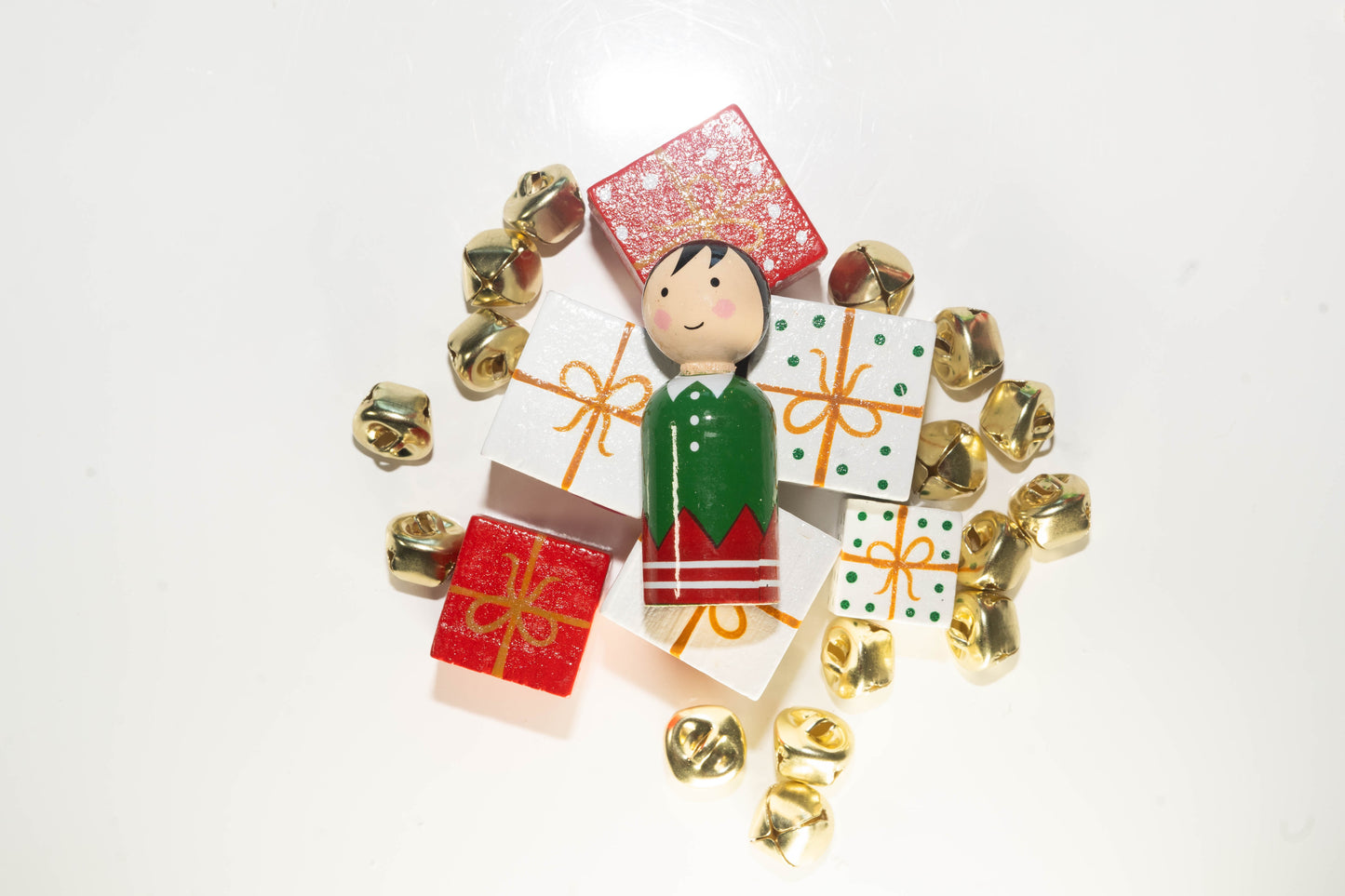 Wooden elf peg doll with wooden block Christmas presented and gold jingle bells