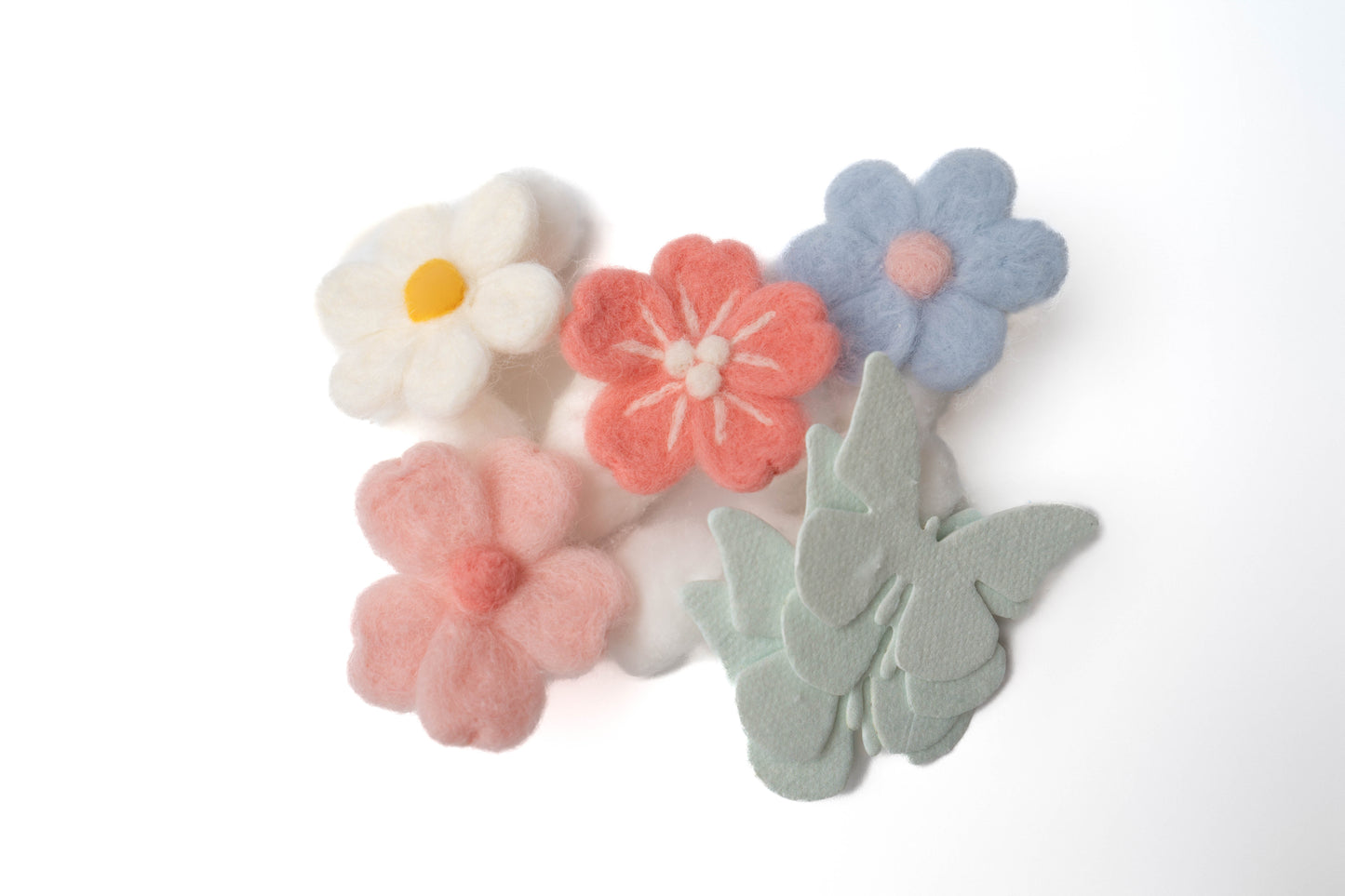 Felt flowers (pink hibiscus, purple and yellow daisy) with blue seed paper butterflies