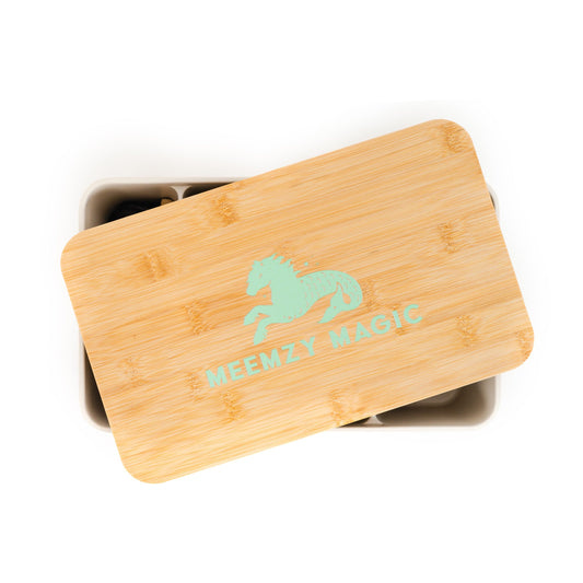 a box with the Meemzy Magic logo from above representing subscriptions