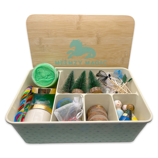 Sensory kit in box showing contents for the planet protector kit including peg dolls, wood rounds, play dough, pipe cleaners, and various mini gardening tools